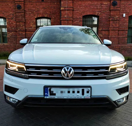 mazowieckie Volkswagen Tiguan cena 88500 przebieg: 148550, rok produkcji 2016 z Żyrardów